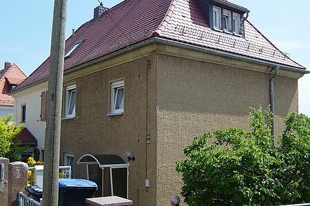 Zweifamilienhaus vor der Sanierung mit Spezialputzfassaden