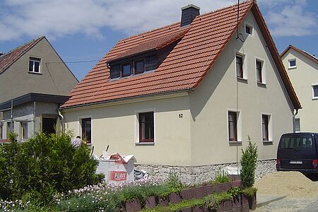Einfamilienhaus während der Fassadensanierung